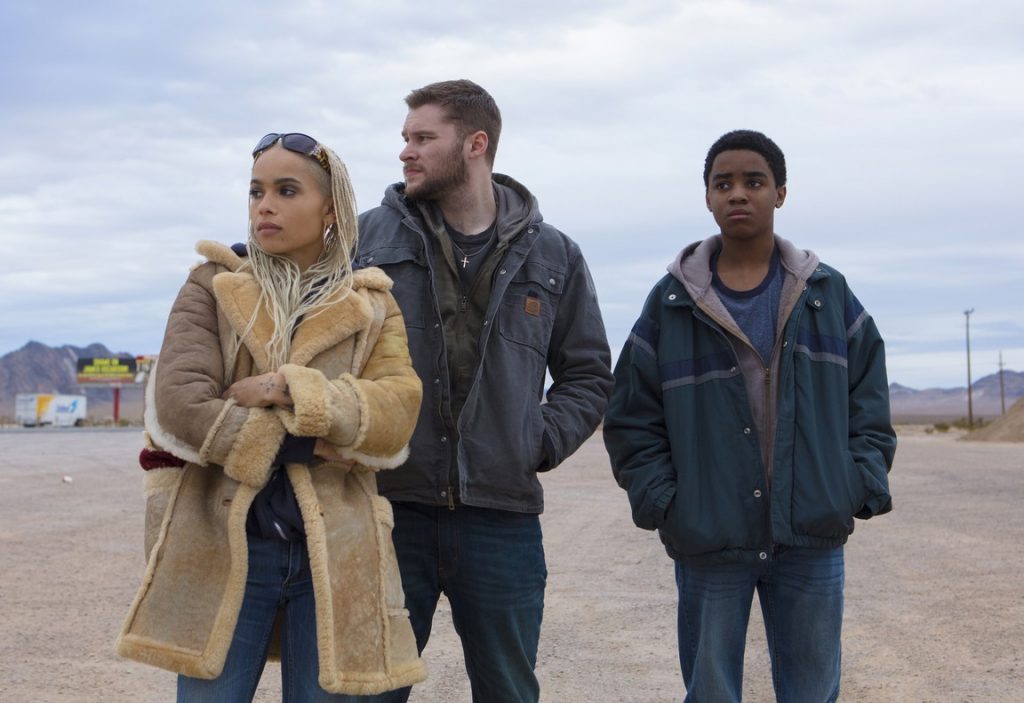 A medium shot of three people. L-R: Zoe Kravitz, Jack Reynor, and Myles Truitt.